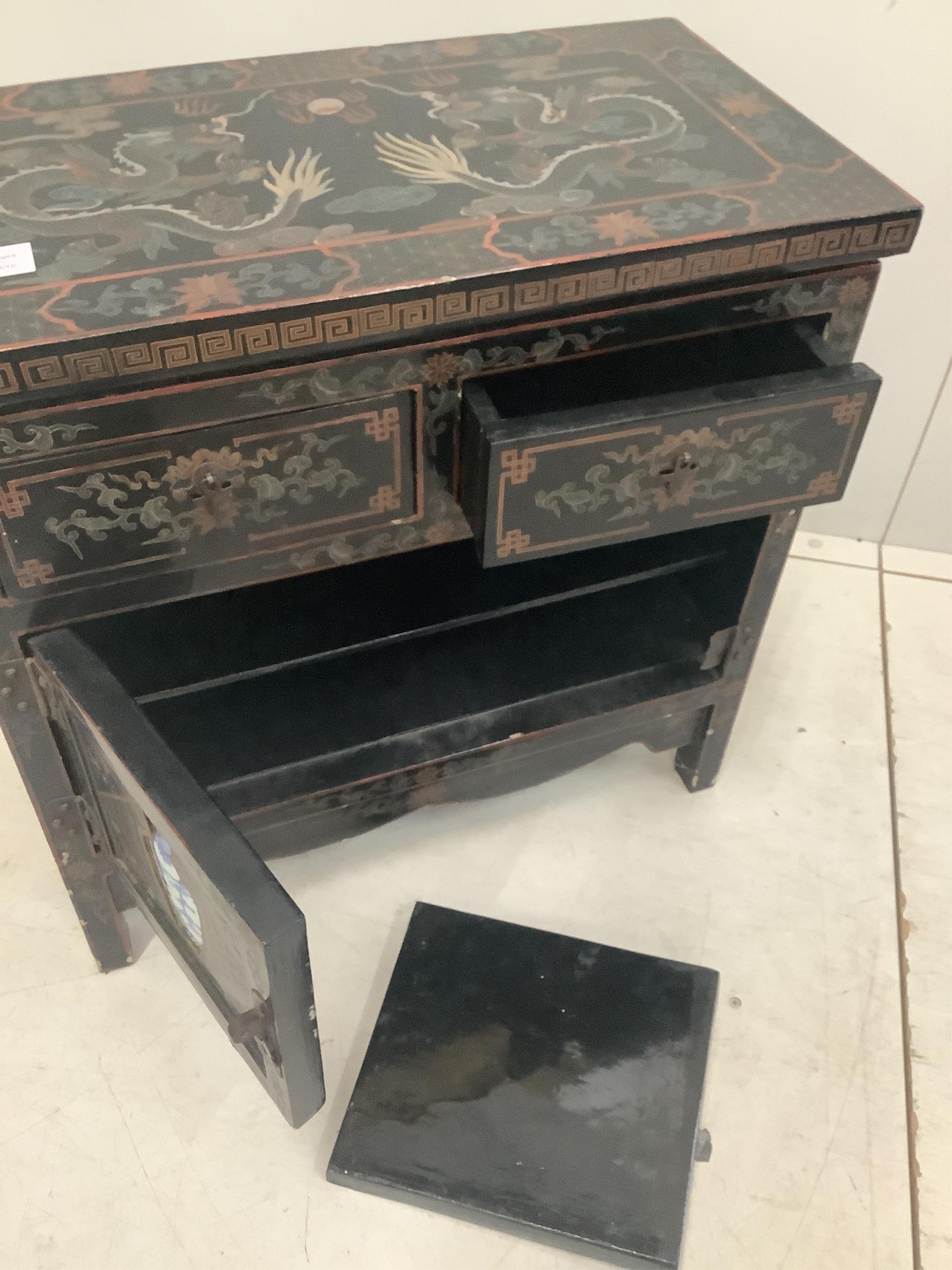 A small Chinese lacquered porcelain mounted side cabinet, width 61cm, depth 33cm, height 60cm